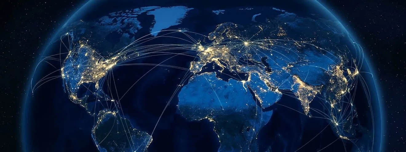Earth at night with illuminated cities and global connections